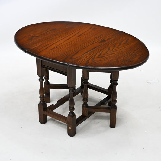 Old Charm Drop Leaf Long Oval Coffee Table Tudor Brown Finish FREE* UK Delivery